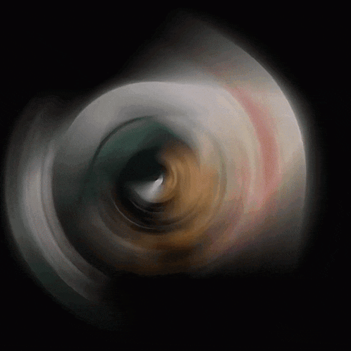 a blurred image of a circle with a dark background