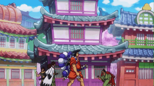 a group of people walking in front of a building