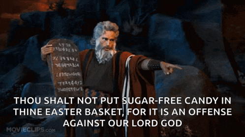 a movie clip from movieclips.com shows a man holding a bible