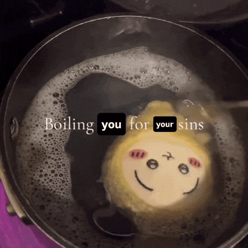 a pot of boiling water with a smiley face in it