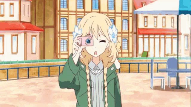 a girl is taking a picture of herself with a camera