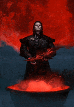 a man in a black coat stands in front of a cauldron with red liquid coming out of it