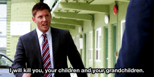 a man in a suit and tie says " i will kill you "