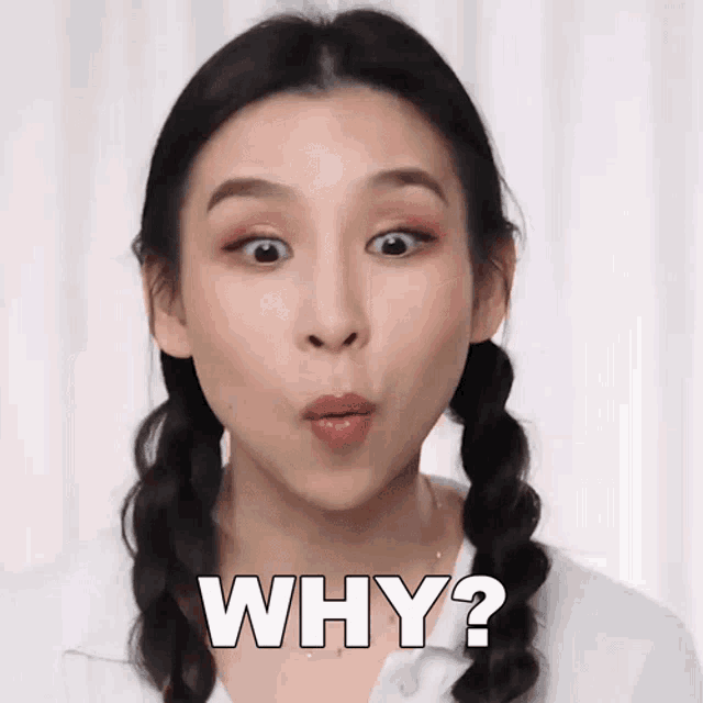 a woman with pigtails making a funny face and the words why behind her