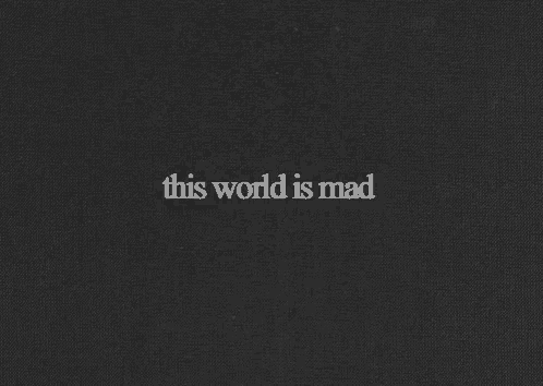 a black background with the words " this world is mad "
