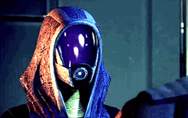 a person wearing a purple helmet with a hood on their head