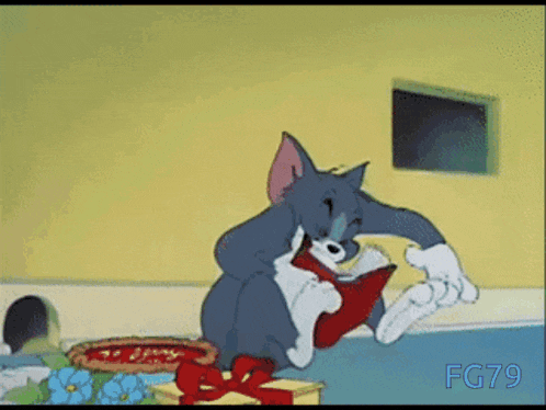 a cartoon of tom and jerry reading a book with fg79 on the bottom