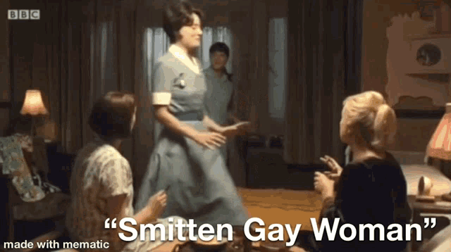 a group of women are dancing in a living room with the caption " smitten gay woman " on the bottom