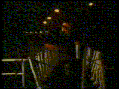 a blurred image of a person standing in the dark
