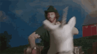 a man is riding on the back of a white unicorn .