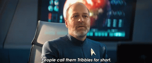 People Call Them Tribbles For Short Edward Larkin GIF - People Call Them Tribbles For Short Edward Larkin Star Trek Short Treks GIFs