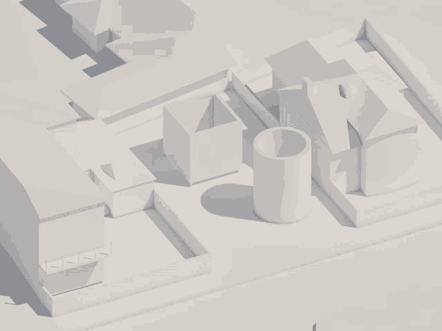 an aerial view of a residential area with a white cylinder in the middle