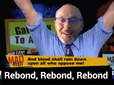 a man with his arms in the air in front of a screen that says rebond rebond rebond