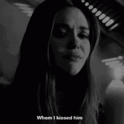 a black and white photo of a woman with the words " when i kissed him " on the bottom