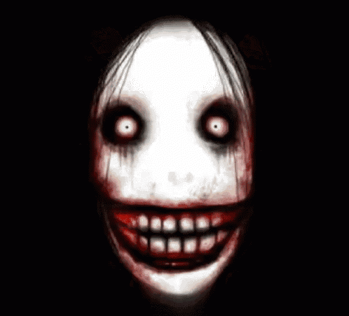 a close up of a scary face with blood on it and a big smile .