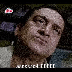 a man is making a funny face and saying assssss-heeee .