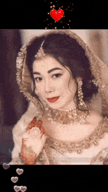 a woman in a white and gold dress with a red heart above her head