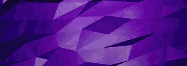 it looks like a purple and yellow background with a geometric pattern .