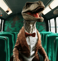 a dinosaur in a tuxedo and bow tie is sitting on a bus