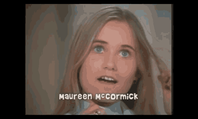maureen mccormick is the name of the woman in this photo