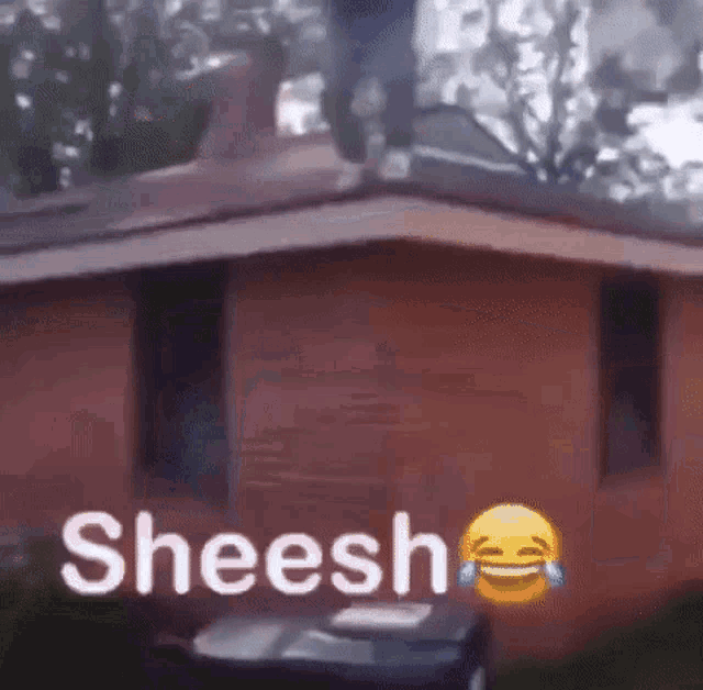 a man is jumping off the roof of a brick house next to a car .