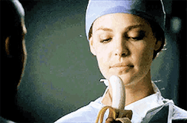 Greys Anatomy Alex And Izzie GIF - Greys Anatomy Alex And Izzie Banana GIFs