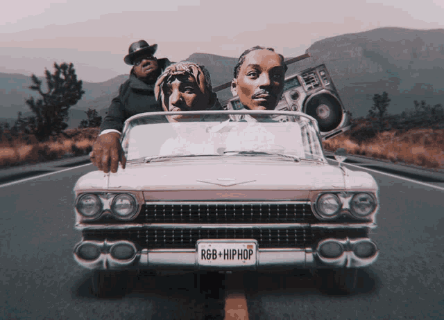 a white car with a license plate that says rgb + hiphop