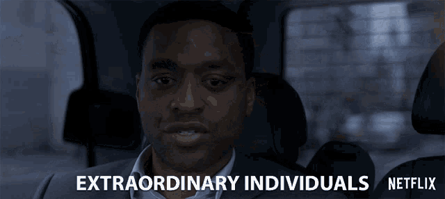 a man in a suit is sitting in the back seat of a car with the words extraordinary individuals netflix on the bottom