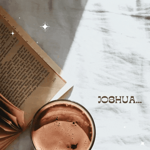 a book is open to page 119 and a cup of coffee is on the table