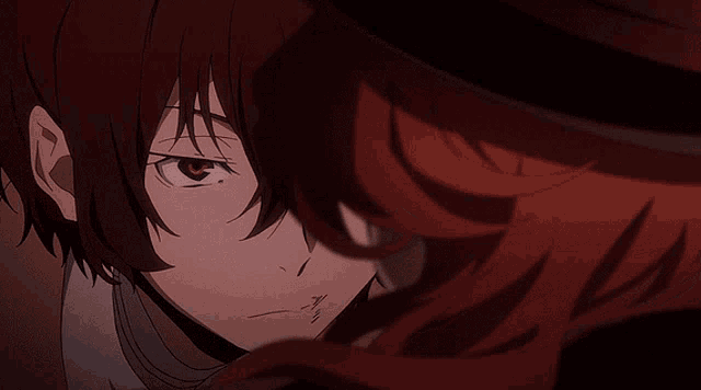 a close up of a person with red hair