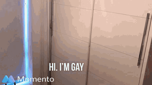 a white wardrobe with the words hi i 'm gay on the bottom