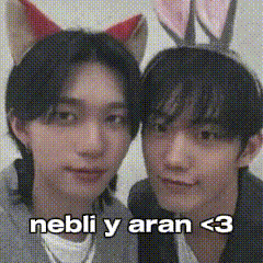two young men wearing bunny ears are posing for a picture and the caption says nebli y aran < 3
