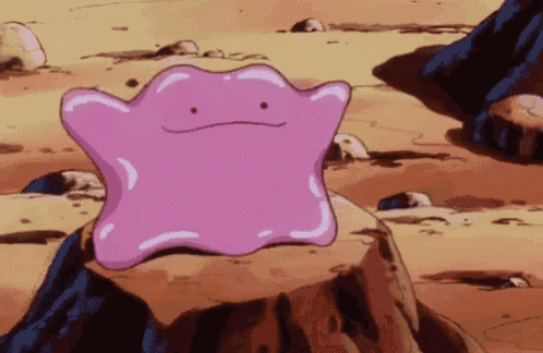a purple cartoon character is sitting on a rock .