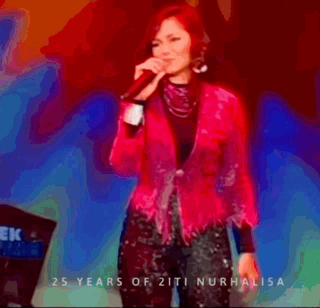 a woman in a red jacket singing into a microphone with the words 25 years of 2ti nurhalisa written below her