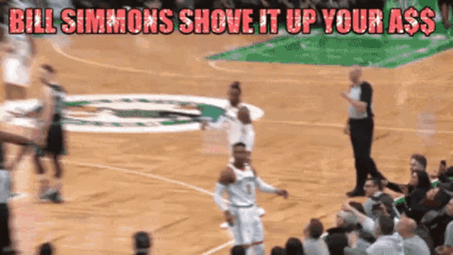 a basketball game with the words bill simmons shove it up your ass above it