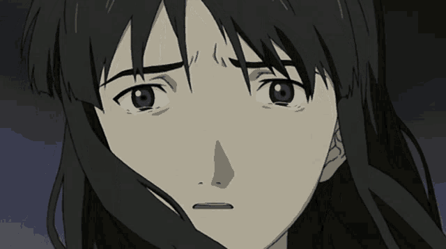 a close up of a cartoon character 's face with a serious look on her face