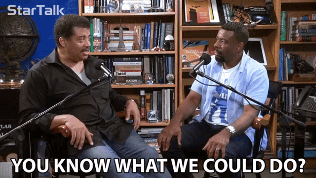 two men sitting in front of microphones with the words you know what we could do on the bottom