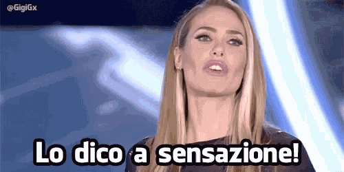 a blonde woman is standing in front of a blue background and says lo dico a sensazione !