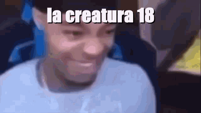 a close up of a person 's face with the words la creature 18 written above it .