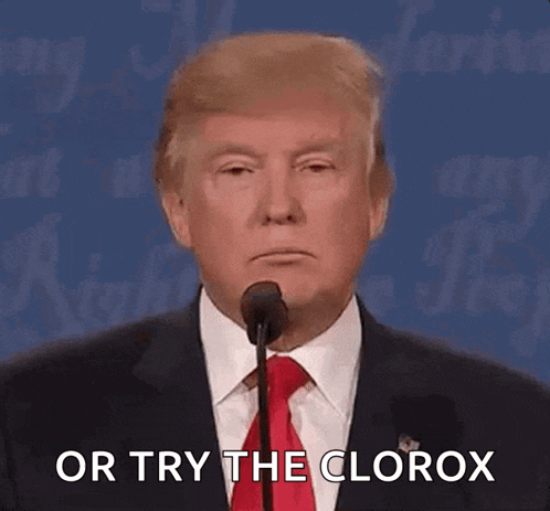 donald trump is giving a speech at a debate and says " or try the clorox "