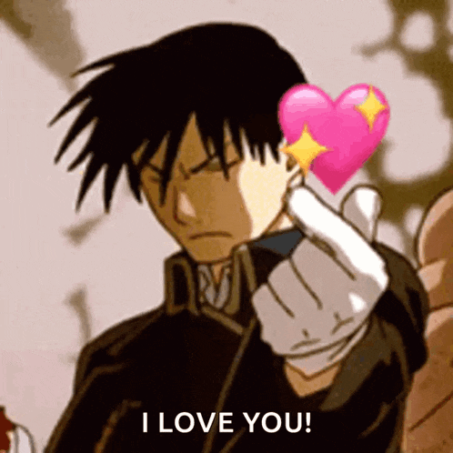 a man is holding a pink heart and says i love you