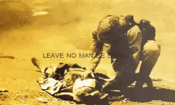 a soldier is laying on a stretcher with the words leave no man behind