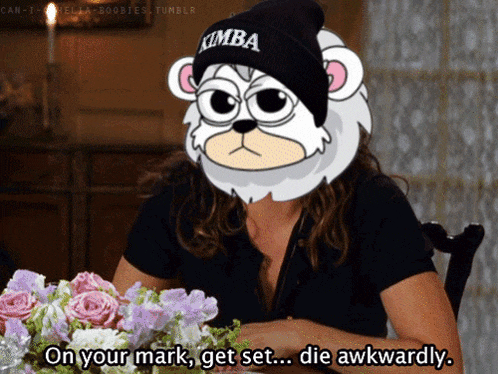 a woman wearing a beanie with kimba on it
