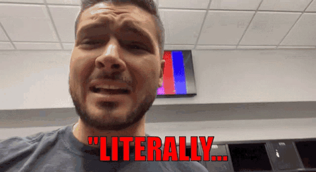 a man with a beard says " literally " in red letters