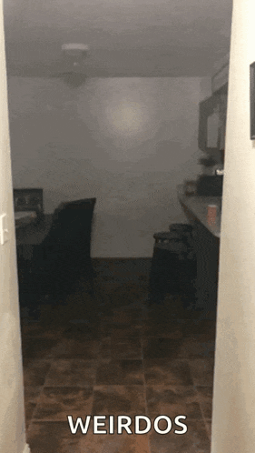 a dark room with the words weirdos written on the bottom