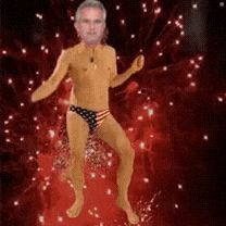 a naked man in an american flag underwear is dancing in front of a fireworks display
