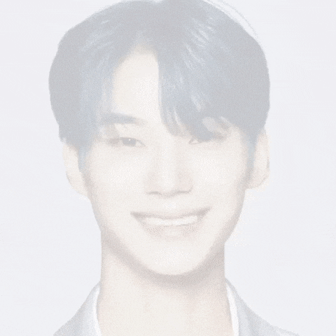 a close up of a person 's face with a smile on it .