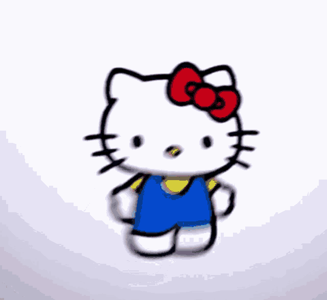 a blurry picture of a hello kitty with a pink bow on her head