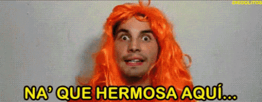 a man wearing an orange wig with the words na que hermosa aqui