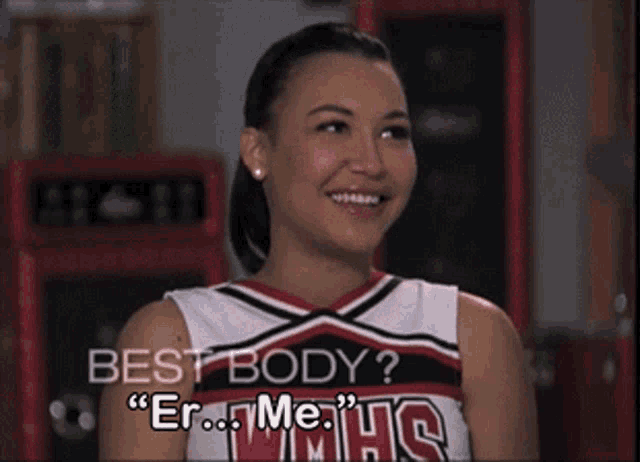 a cheerleader is smiling and says best body